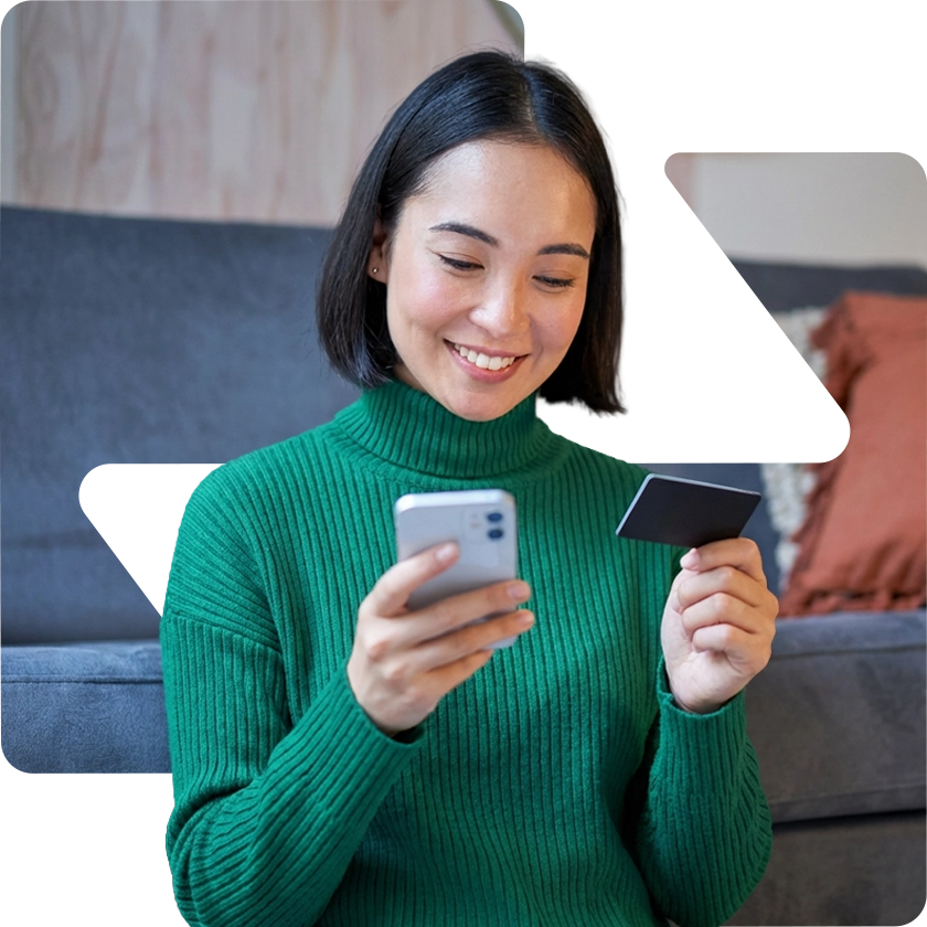 Mulher usando o app da Quita para parcelar Pix no cartão
